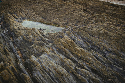 Full frame shot of water flowing through rocks