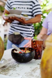 Close-up of food and drink served on table