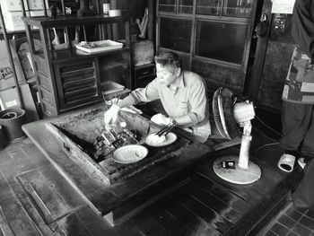 Man preparing food in kitchen