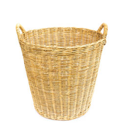 Close-up of wicker basket against white background