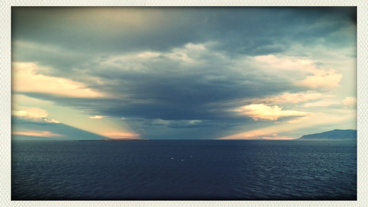 transfer print, sea, water, tranquil scene, scenics, sky, tranquility, horizon over water, beauty in nature, auto post production filter, waterfront, sunset, nature, cloud - sky, cloud, idyllic, rippled, cloudy, seascape, outdoors