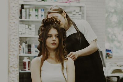 Side view of young woman looking away