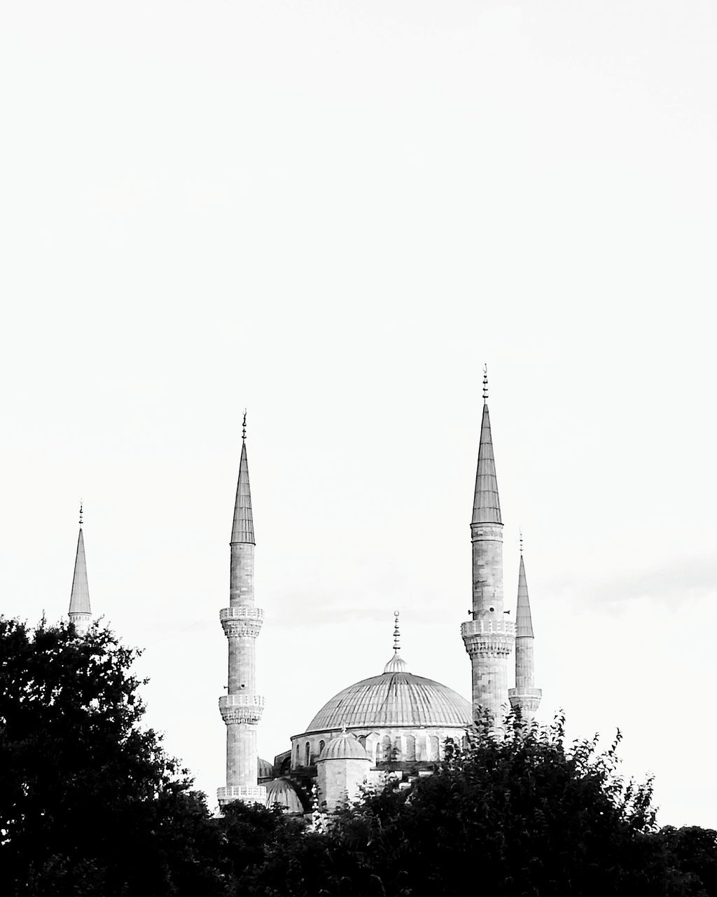 sky, built structure, architecture, building exterior, copy space, travel destinations, nature, religion, building, plant, place of worship, spirituality, tree, travel, tower, no people, belief, tourism, clear sky, outdoors, spire