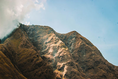 Low angle view of mountain against sky