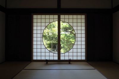 Plants seen through window at komyo-in,toufukuji temple.kyoto.