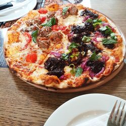 High angle view of pizza on table