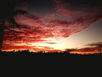 Scenic view of dramatic sky during sunset