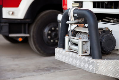 Close-up of vehicles on road