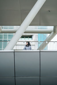 People standing in modern building