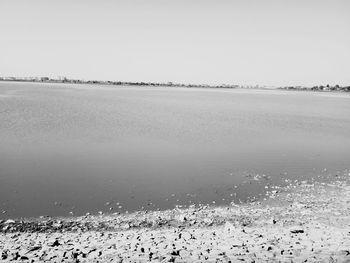 Scenic view of lake against clear sky