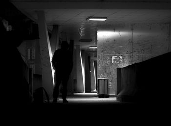 Man walking in corridor