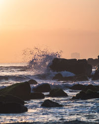 Scenic view of sea against sky during sunset