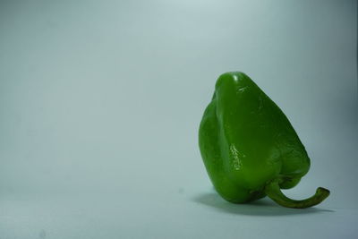 Close-up of green bell peppers on table