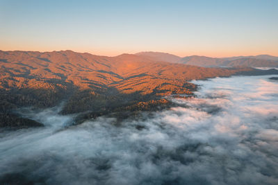 Scenic view of mountains against sky during sunset