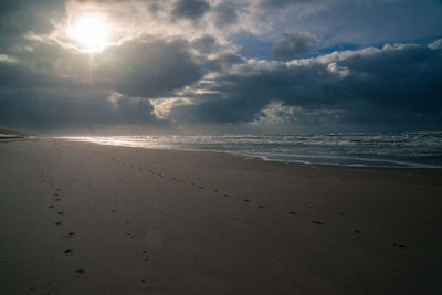 Scenic view of beach against sky