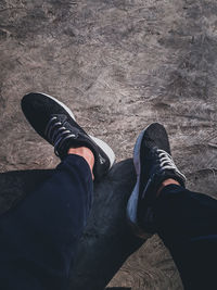 Low section of person wearing shoes