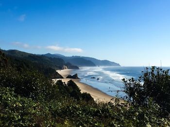 Scenic view of beach against sky