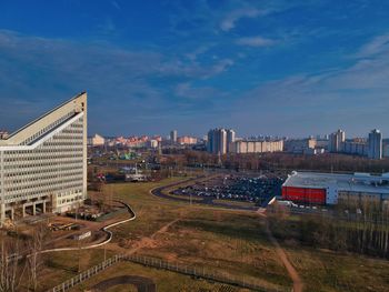 High angle view of buildings in city against sky