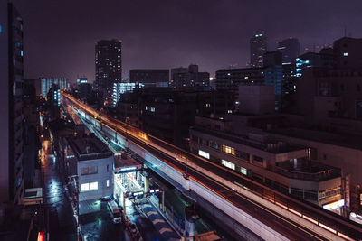 High angle view of illuminated city at night