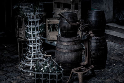 Wine casks on sidewalk at night