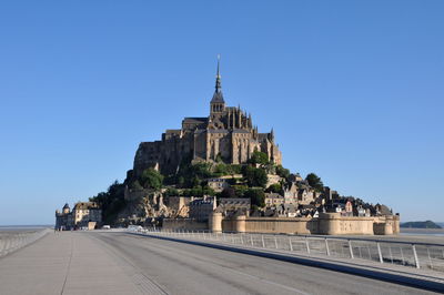 View of historical building against clear blue sky