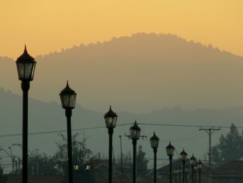 Street light against sky at night