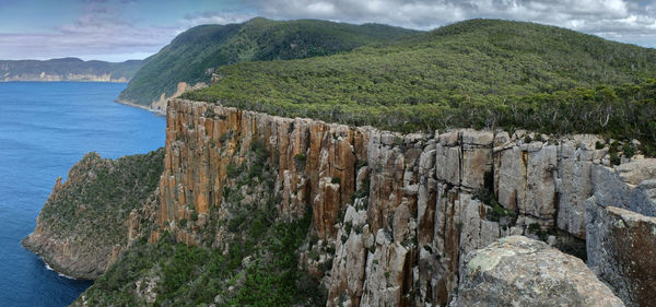 Scenic view of sea cliffs against sky on the tasman peninsula, three capes walk