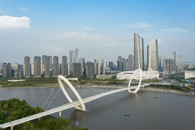 Modern buildings in city against sky