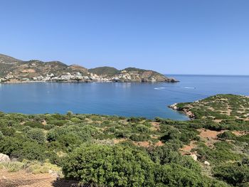 Scenic view of sea against clear blue sky