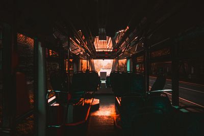 Empty chairs in illuminated room