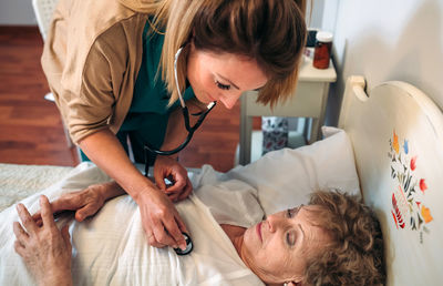Doctor examining patient at hospital