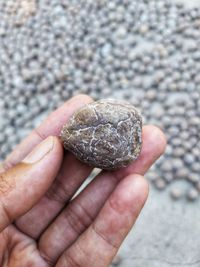 Close-up of hand holding ice cream