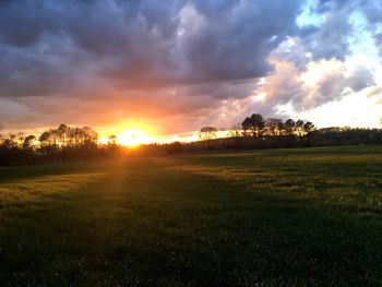 Scenic view of dramatic sky over landscape