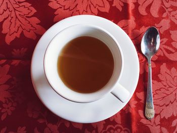 High angle view of coffee cup on table