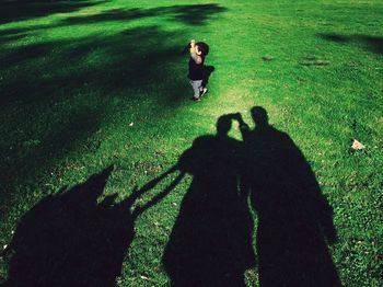 High angle view of child on grass