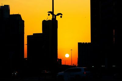 Silhouette of buildings at sunset