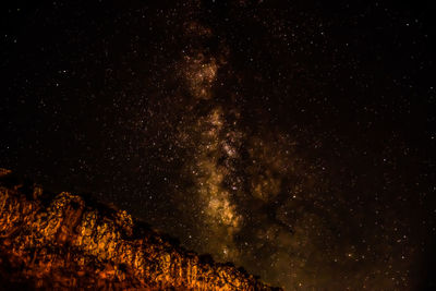 Low angle view of stars in sky at night