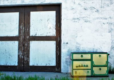 Shot of chest drawer by building entrance