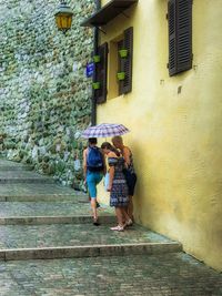 Woman walking on house