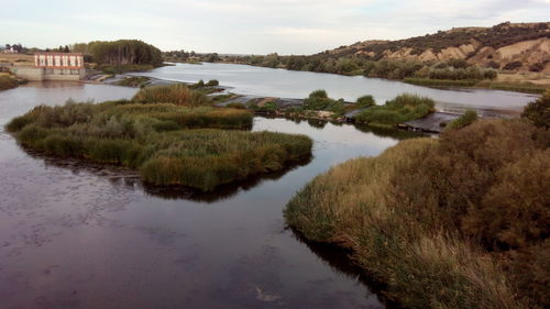 Scenic view of lake against sky