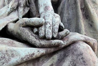 Close-up of the  hands of a statue