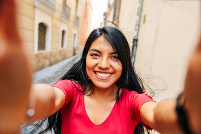 Portrait of smiling young woman