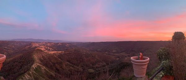 Panoramic view of mountains against sky during sunset