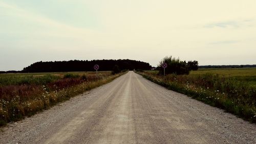 Road passing through field