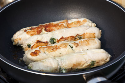 Close-up of sausages in pan