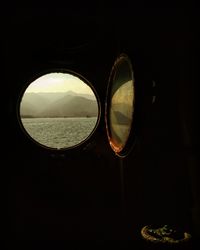 Reflection of sunglasses on glass window