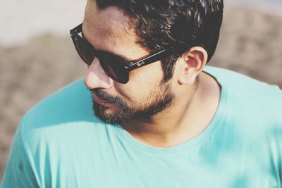 Portrait of young man wearing sunglasses