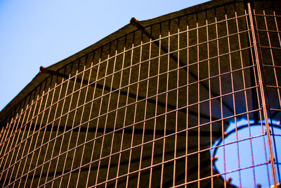 Low angle view of building against clear blue sky