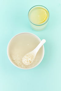 Directly above shot of bowl against blue background
