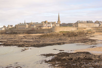 View of the walled city of saint-malo at low tide, france